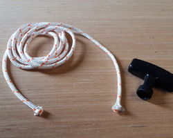 Starter cord and handle for mowers and sweepers