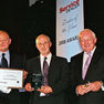 About - Nomark Equip receiving 'ATV Dealer of the Year 2008' award