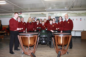 From Quads To Quavers. Tenbury Town Band Buy Two Yamahas! - Tenbury Town Band members with the New Yamaha Timpani Drums.